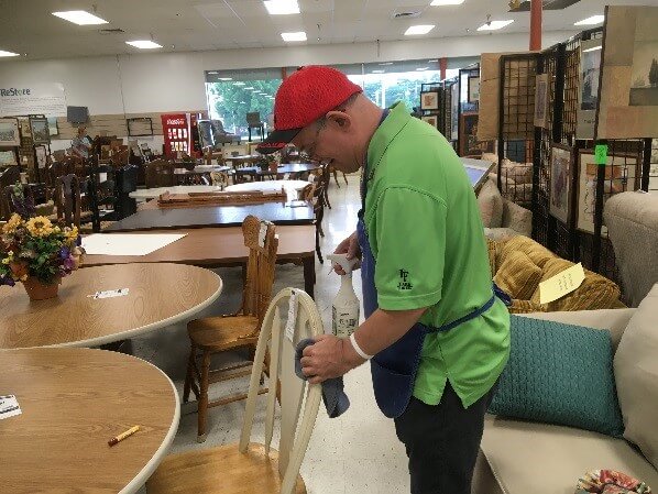 Person cleaning.